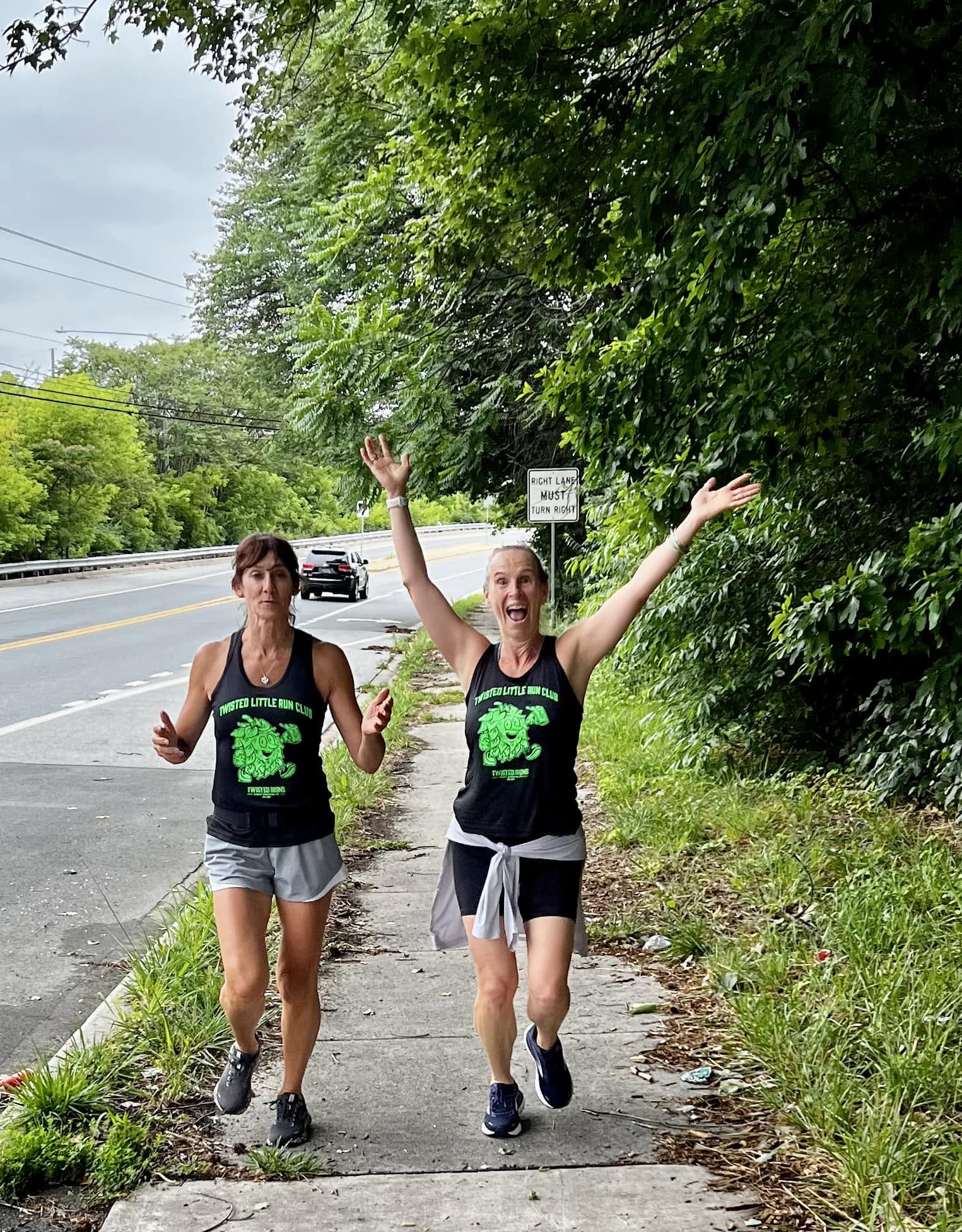 Two Twisted Little Run Club members enjoying an outdoor route